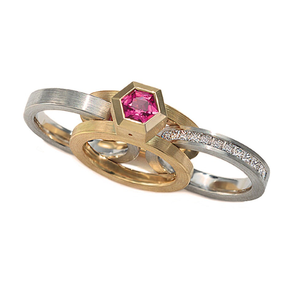 6 mm hexagonal pink sapphire bezel set in 18k yellow gold with flat band rings