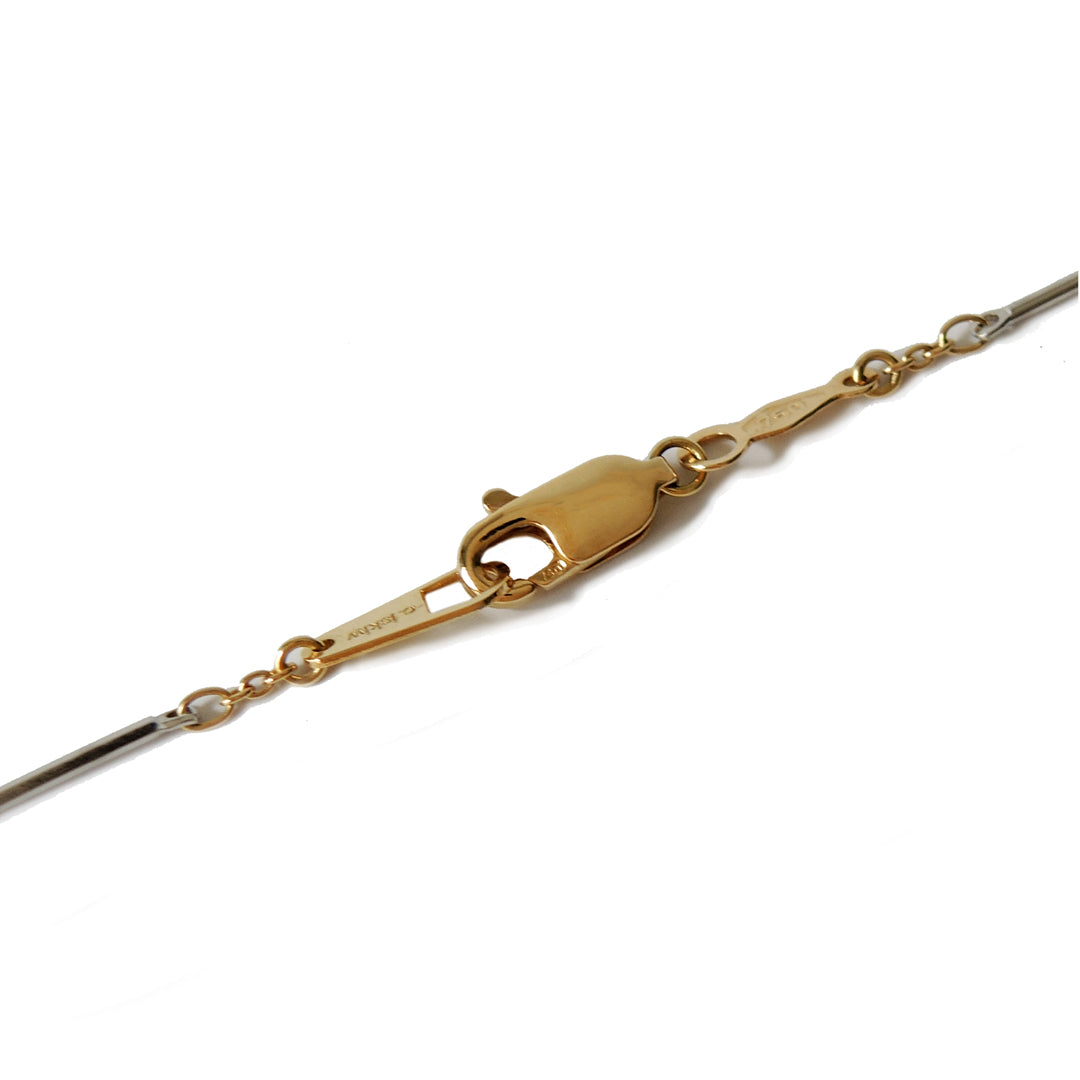 Platinum bar and 18k gold cable chain with a simple lobster clasp