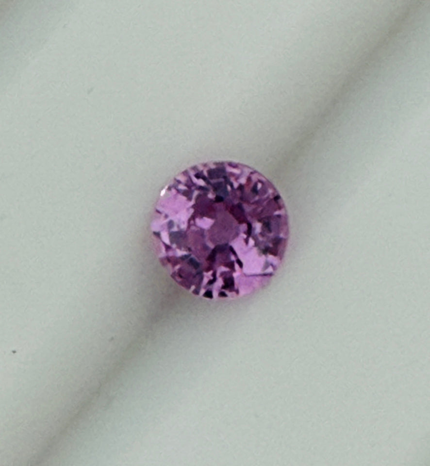6.1 mm pink sapphire native cut 