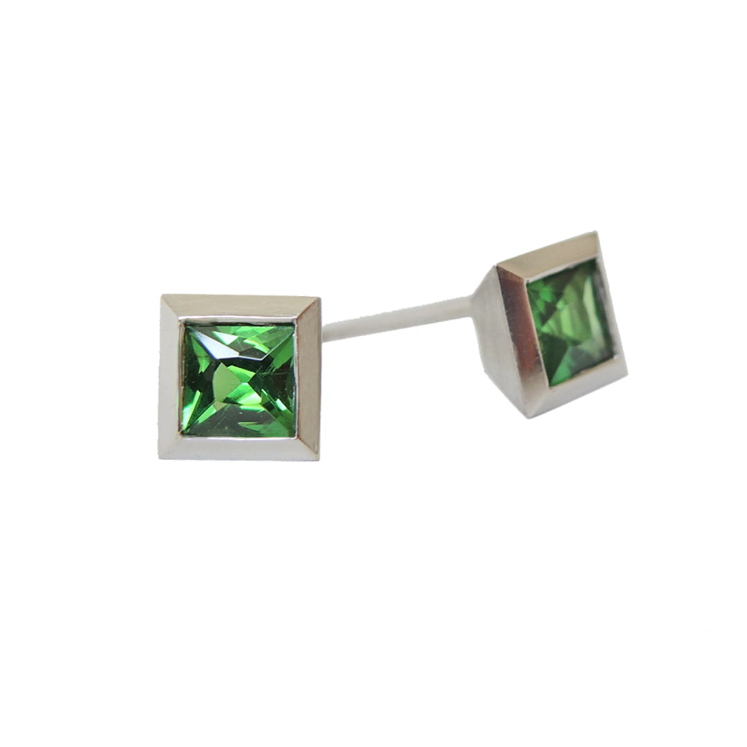 pair of princess cut tsavorite studs with front and side view