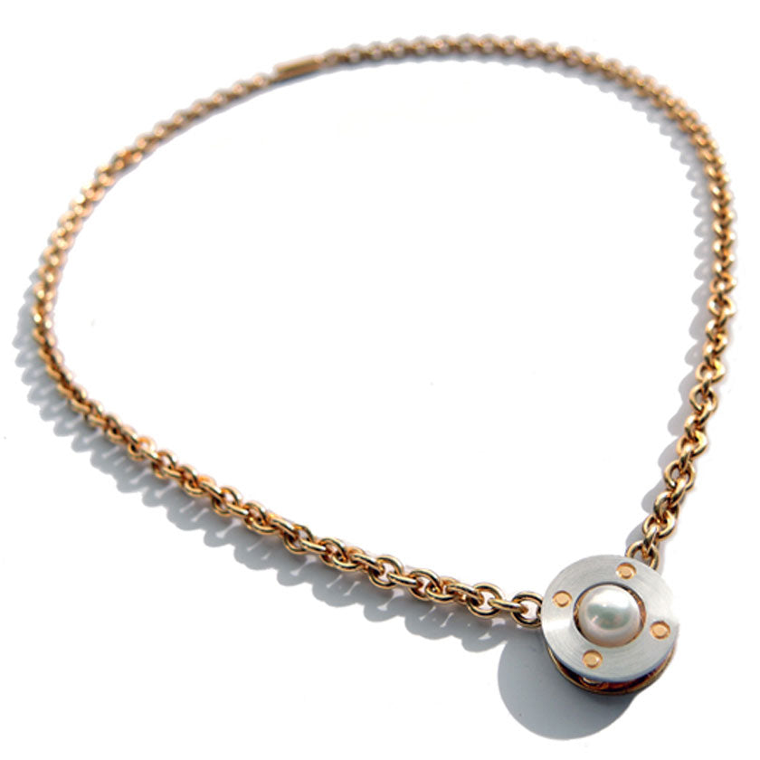 Gold necklace with a modern pearl pendant on a white background