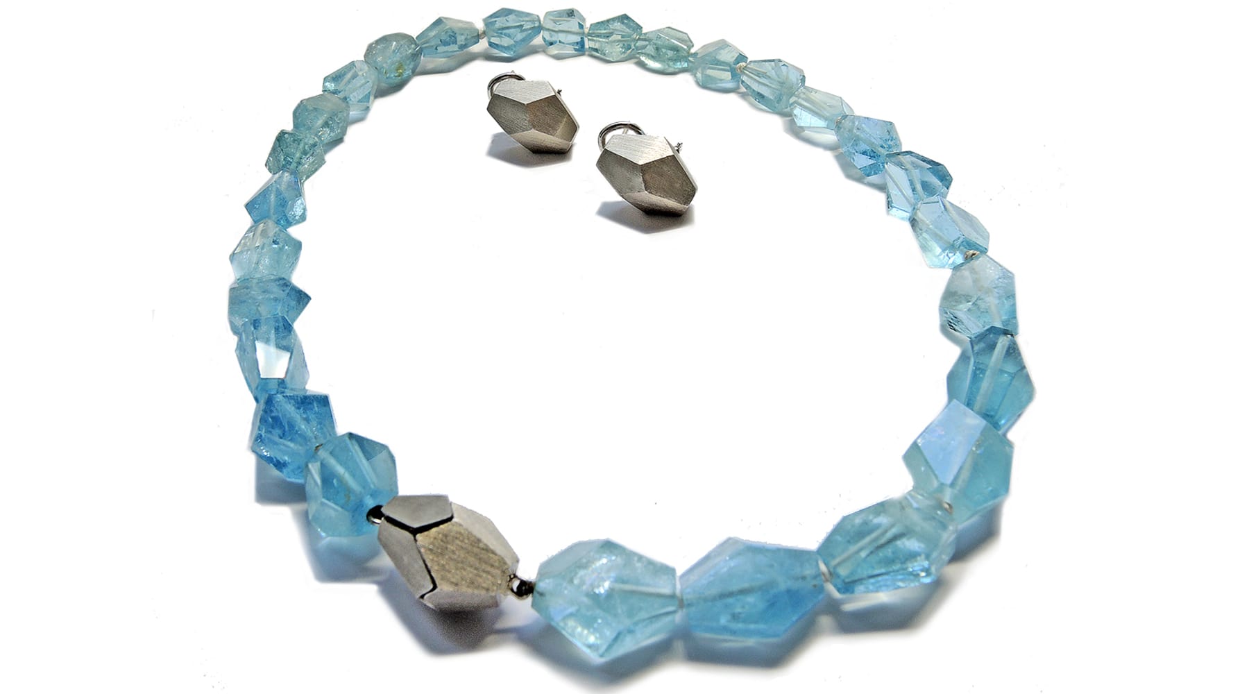 Large freeform bead aquamarine necklace with special 18k white gold clasp and matching earrings.