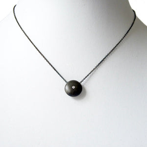 Series 44- Ellipse | Small Pendant, Blackened Silver, Diamond + Ruby
