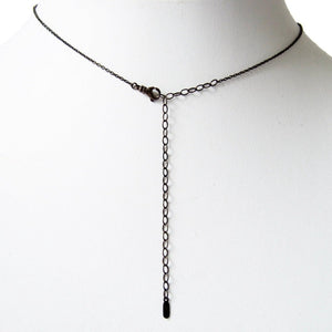Series 44- Ellipse | Small Pendant, Blackened Silver, Diamond + Ruby