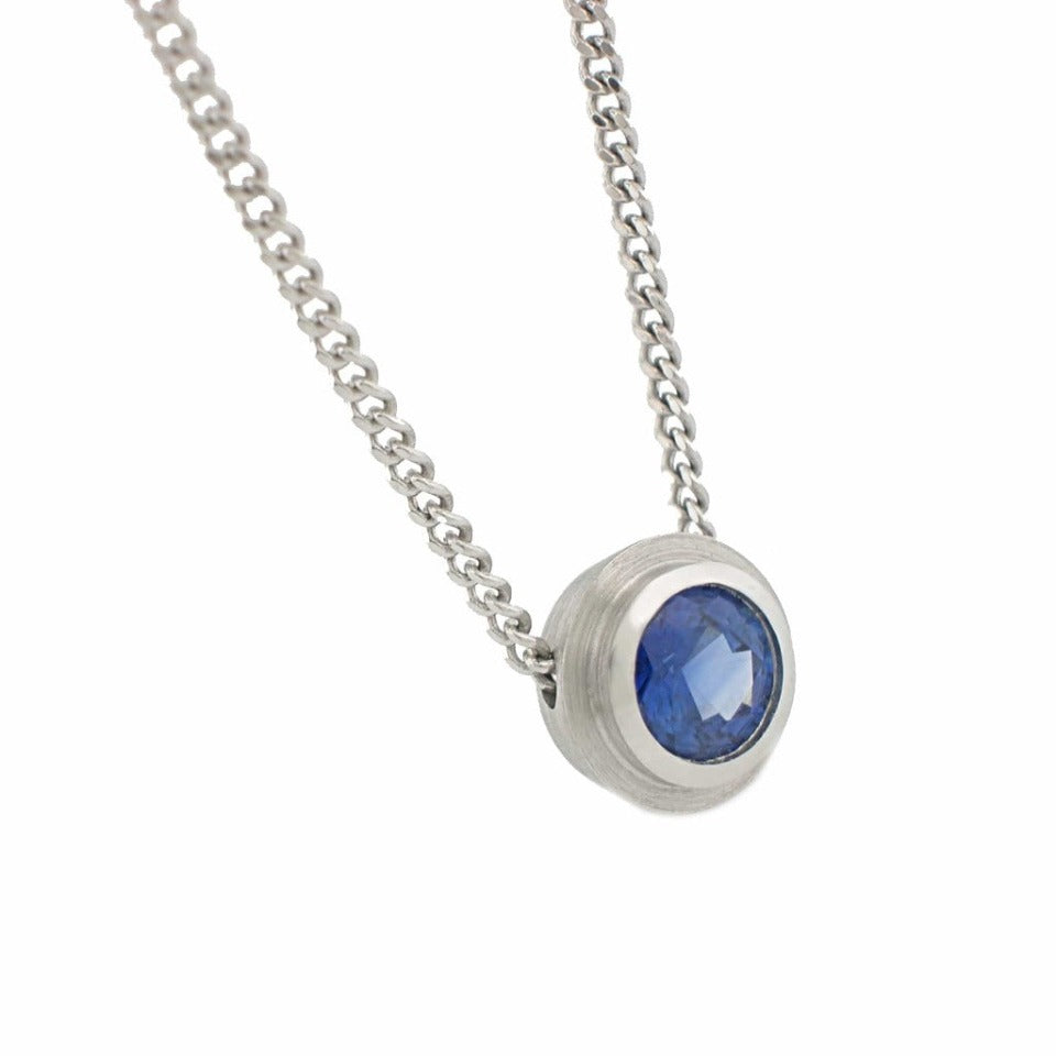 Series 8 - Simplicity | Double Bezel, Solitaire Pendant, Plat. + Sapphire