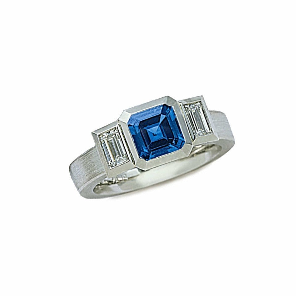 Series 20 - Oblique Fine | 3 Stone Ring, Plat. + 6.5 mm Sapphire, Diamond