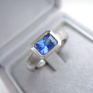 Series 20 Ring - Oblique Fine | East West Solitaire Ring in Palladium + Blue Sapphire